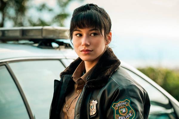 Corporal Edwina Yen in Murder in a Small Town